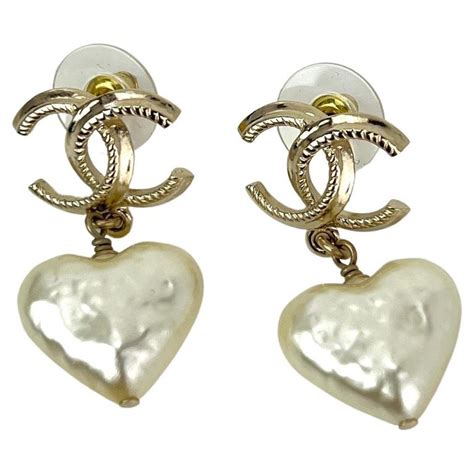 chanel cc heart pearl earrings|chanel pearl drop earrings price.